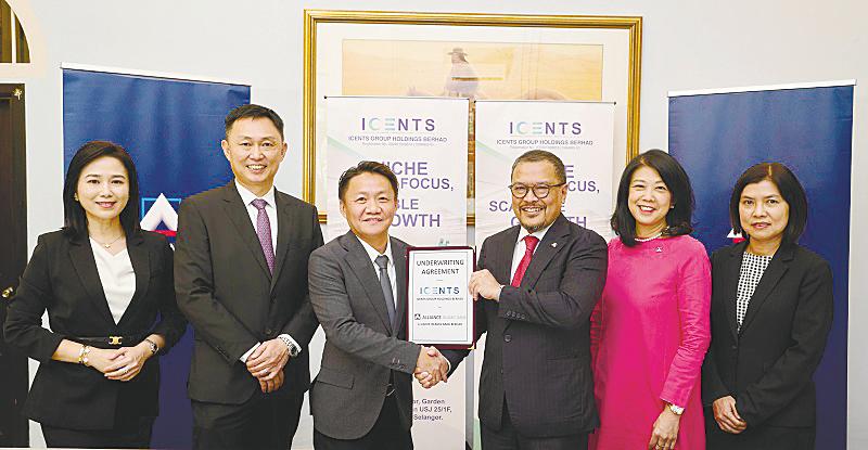 From left: iCents Group executive directors Tan Wei Ying and Foo, Ong, Alliance Islamic Bank CEO Rizal IL-Ehzan Fadil Azim, Alliance Bank Malaysia Bhd group chief corporate and institutional banking officer Teoh Chu Lin and Alliance Islamic Bank head/senior vice-president, coverage and origination of Islamic capital markets Lim Shueh Li.