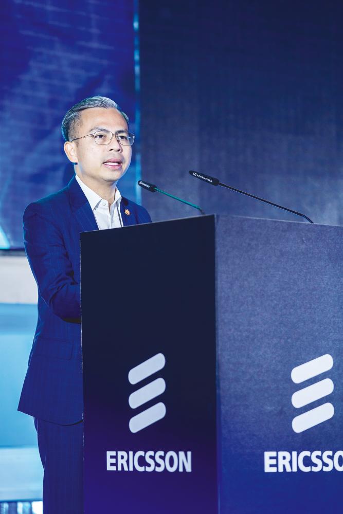 Fahmi delivering his speech at Ericsson Imagine Live Malaysia 2023.