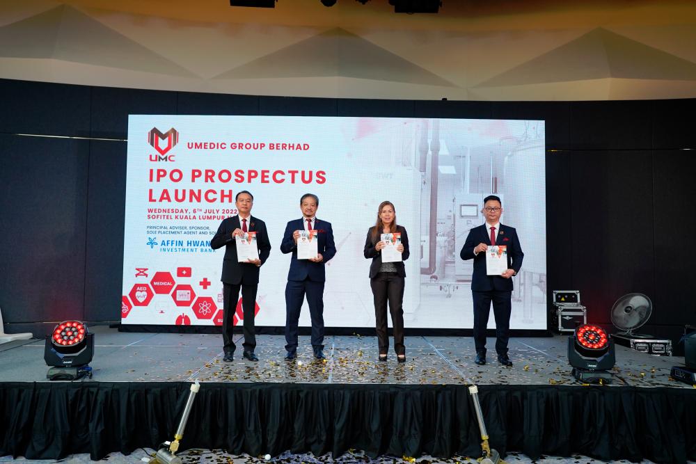 From left: UMC director Lau Chee Kheong, chairman Datuk Ng Chai Eng, Affin Hwang Investment Bank chairman Tunku Afwida Tunku A Malek and Lim at UMC’s IPO prospectus launch.