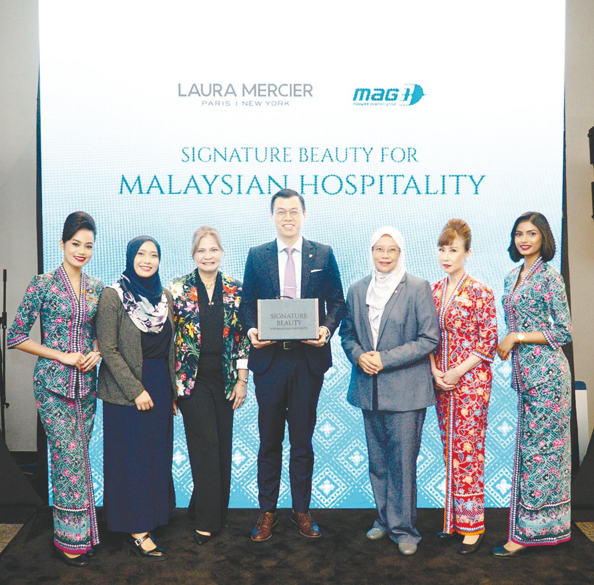 Starting third from left: Malaysia Aviation Group head of partnerships Ainul Nazifah Abdul Rahman, chief strategy and transformation officer Bryan Foong and Aida Salfaraz at the ceremony to announce the partnership.