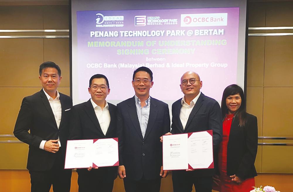 From left: OCBC Bank managing director &amp; head of commercial banking Kevin Choo Cham Woon, Teoh, Ooi and Ideal Property Group COOs Datuk Goh Teng Whoo and Connie Ang.