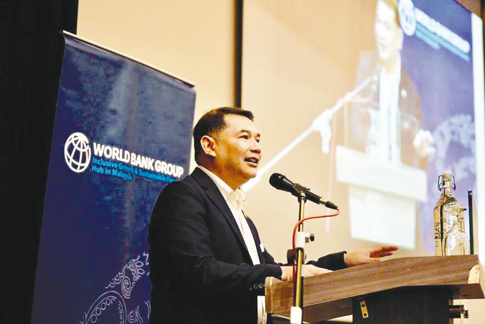 Rafizi speaking at the launch of the World Bank’s October 2023 Malaysia Economic Monitor.