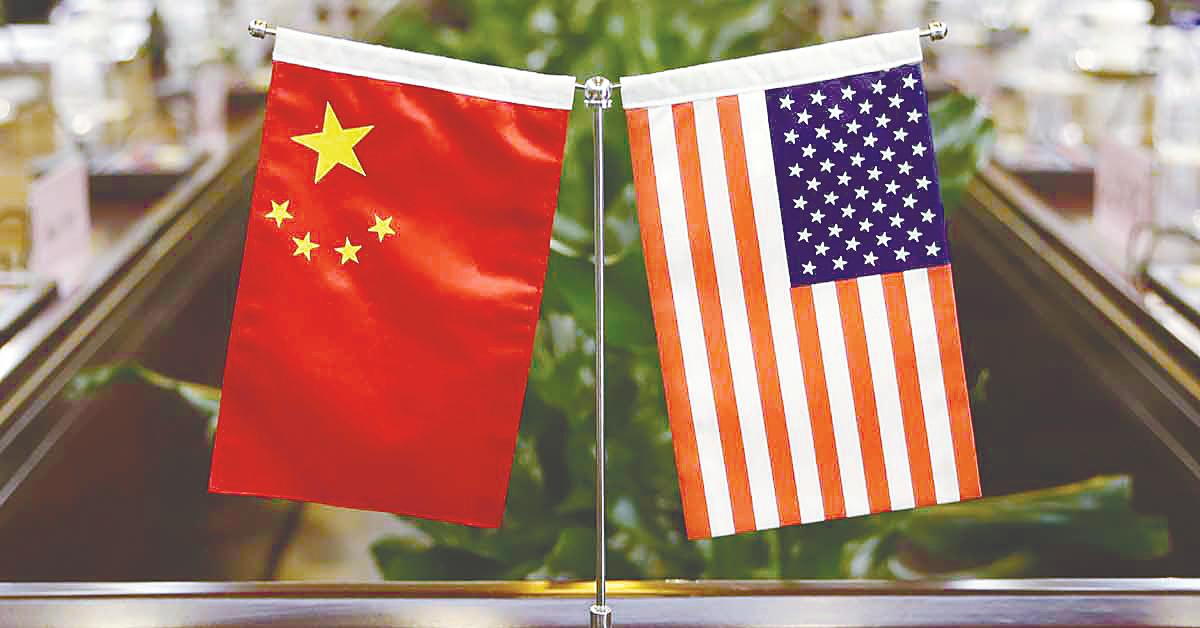Beijing and Washington reaffirm trade commitments, with China set to review export approvals and the US to lift select measures. – AFPPIX