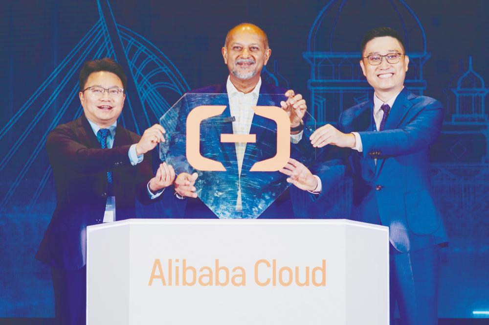 From left: Alibaba Cloud Intelligence International vice-president Bridge Song, Gobind and Kun at the launch.