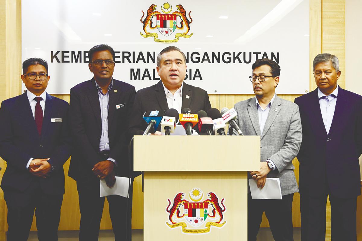 Loke speaking at a media briefing on the merger between CAAM and Mavcom in Putrajaya today. – Bernamapic