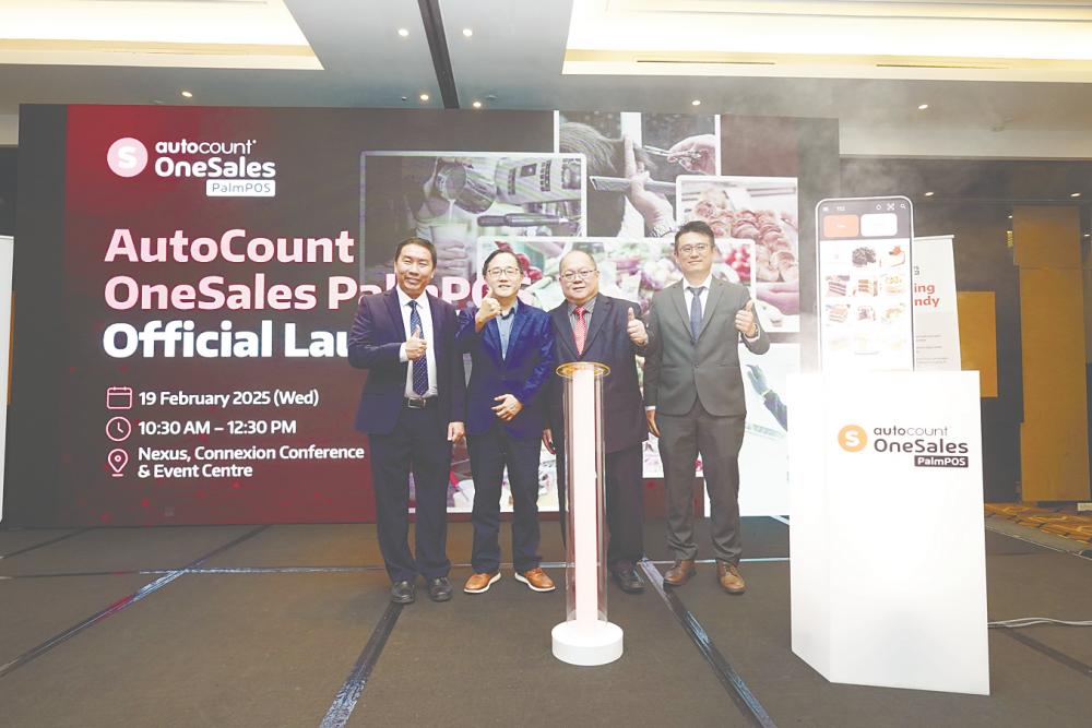 From left: AutoCount Dotcom senior channel sales manager Christopher Liew, executive director Choo Chin Peng, YT Choo, and sales and marketing director Alex Ng at the launch of AutoCount OneSales PalmPOS.