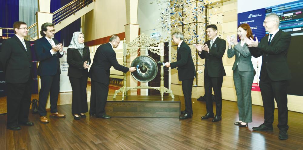 From left: Betamek directors Muhammad Fauzi Abd Ghani, Mohd Shahriman Mohd Sidek, Azlina Abdul Aziz, chairman Ahmad Subri Abdullah, Mirzan, M&amp;A Securities corporate finance managing director Datuk Bill Tan, Betamek director Yap Suan See and M&amp;A Securities corporate finance head Gary Ting at the listing ceremony.