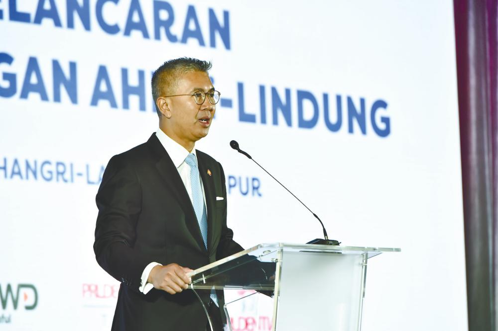 Tengku Zafrul speaking at the launch of EPF i-Lindung. The finance minister says the country’s fiscal space is better than in 2021, given the growth in the economy.