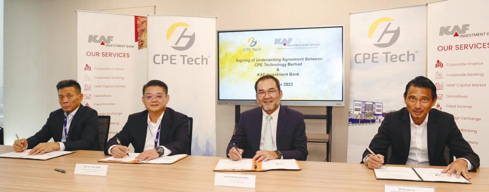 From left: CPE Technology executive director Mu Woon Chai, Lee, KAF IB CEO Rohaizad Ismail and corporate affairs director Michael Ho.