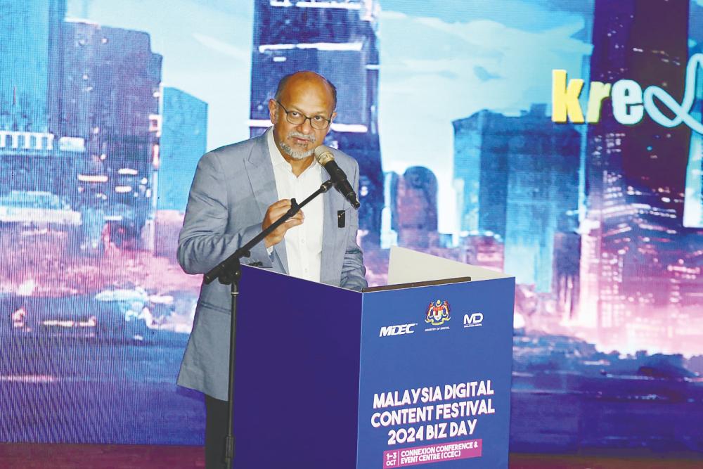 Gobind delivering his keynote speech at Malaysia Digital Content Festival Biz Day 2024.