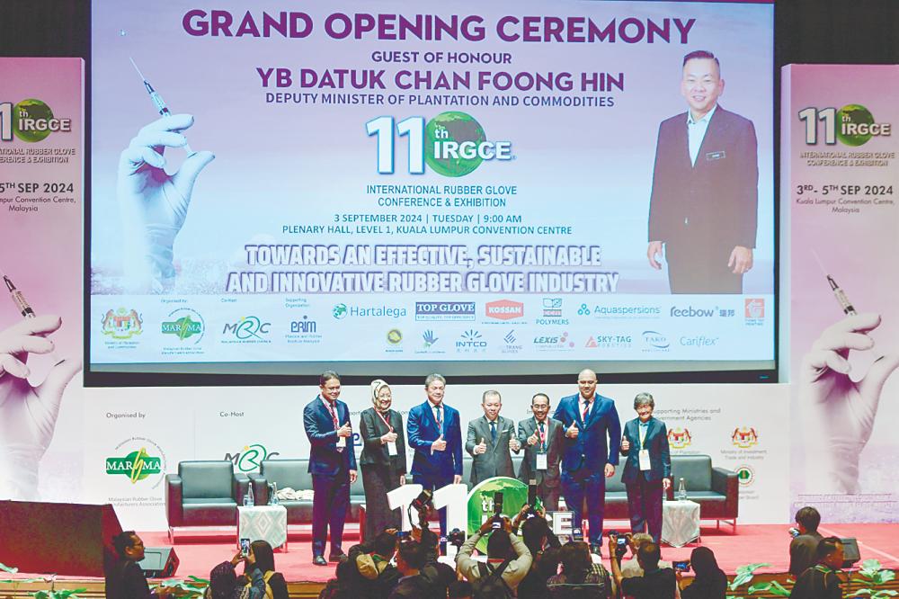 Chan officiating at the International Rubber Glove Conference and Exhibition today. Also present are (from left) Malaysian Rubber Board director-general Datuk Dr Zairossani Mohd Nor, chairman Datuk Zurinah Pawanteh, Oon, Malaysian Rubber Council chairman Datuk Seri Mohamad Suparadi, Malaysian Rubber Council CEO Muhammad Eizaaz and Plastics &amp; Rubber Institute Malaysia president Ng Kha Chan. – Bernamapic