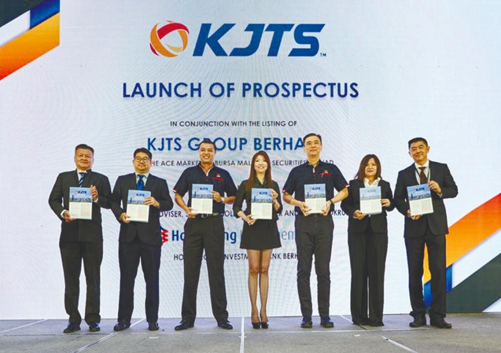 From left: KJTS Group independent non-executive directors Dr Teoh Pek Loo and Ng Kok Ken, Wee, Jim Leng, Kok Choon, KJTS Group independent non-executive director Elaine Law Soh Ying and Hong Leong Investment Bank equity markets head Phang Siew Loong.