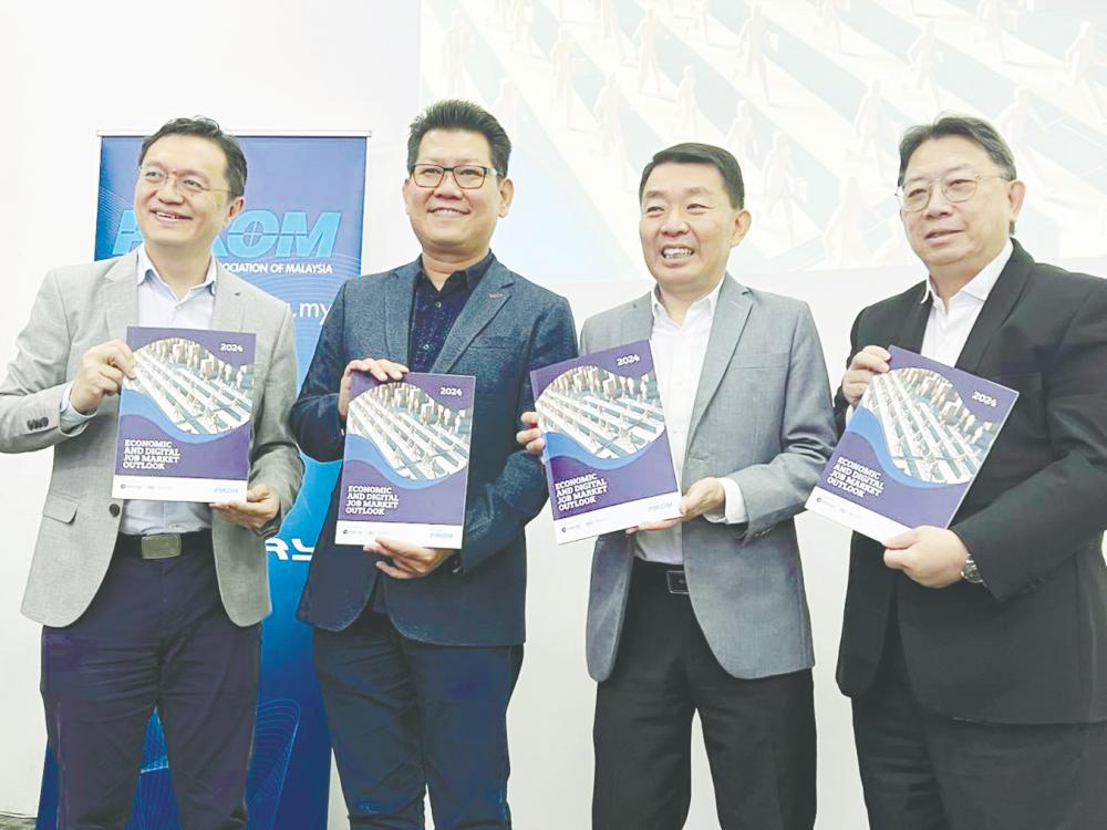 From left: Pikom CEO Ong Kian Yew, vice-president Alex Liew, chairman Ong Chin Seong and Woon at the launch of the Pikom Economic and Digital Job Market Outlook 2024 report.