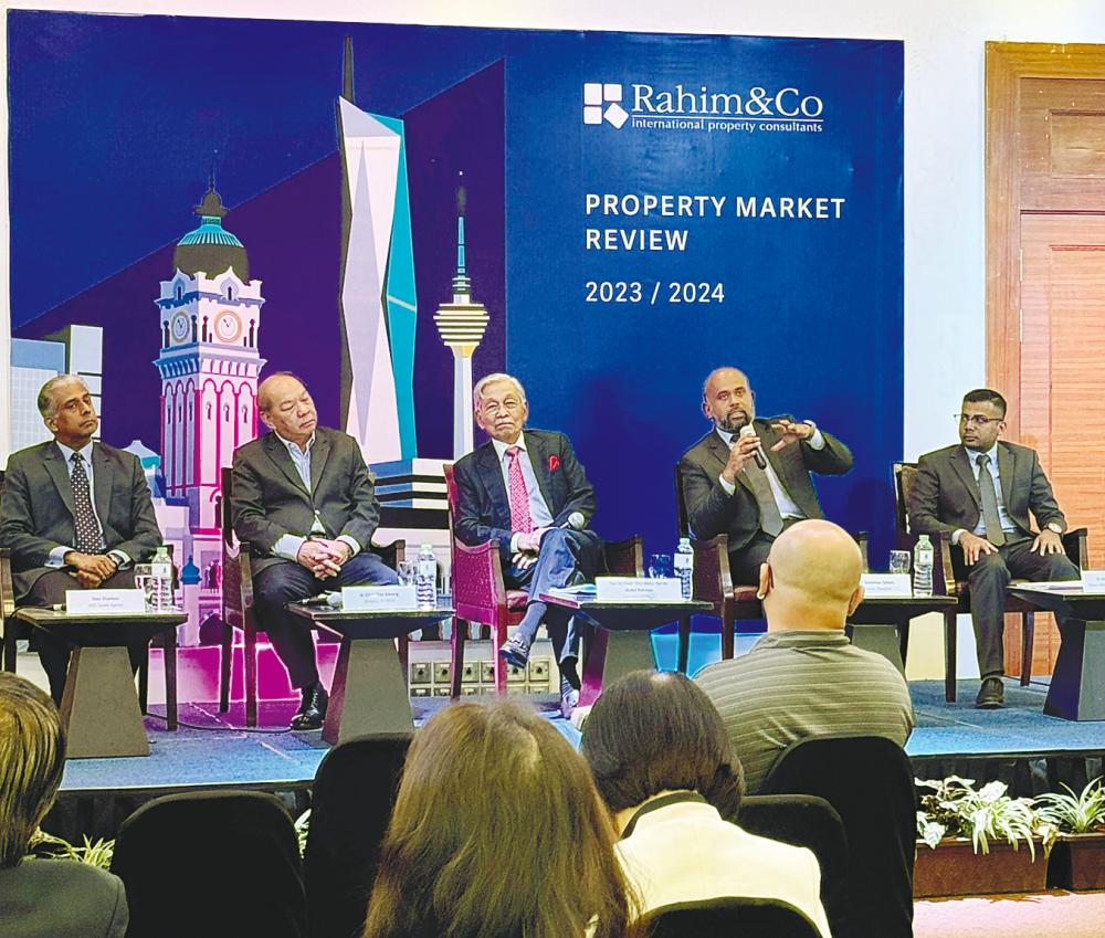 On stage, from left: Rahim &amp; Co International executive chairman Tan Sri (Dr) Abdul Rahim Abdul Rahman, CEO of estate agency Siva Shanker, Sulaiman, Petaling Jaya office director Choy Yue Kwong and valuation services senior manager Mohamad Alhafiz Farouk.