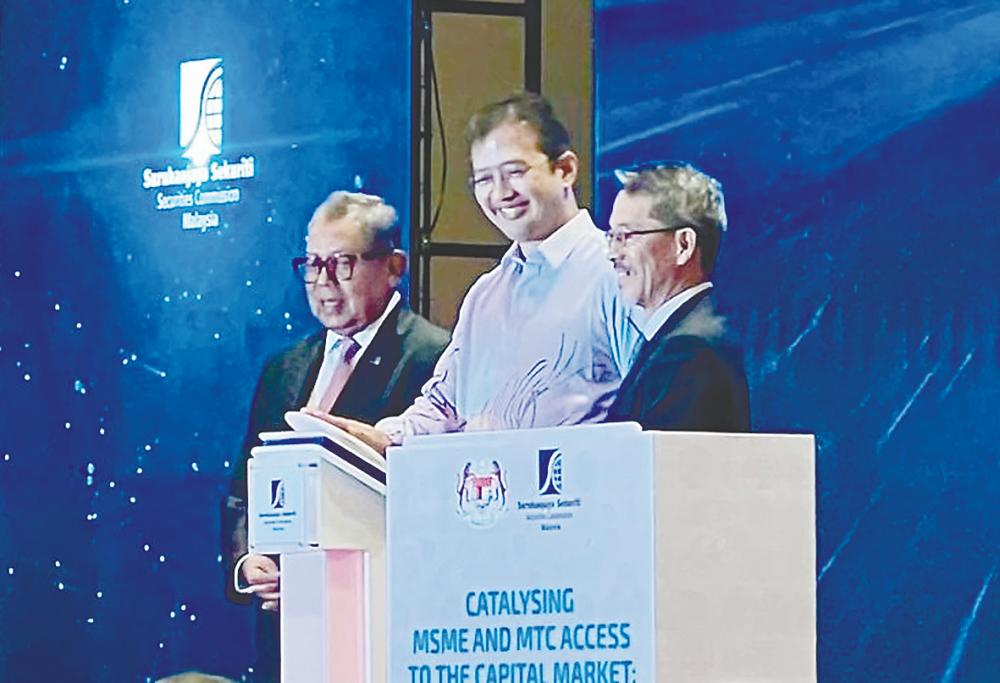 From left: Awang Adek Hussin, Johan Mahmood and World Bank country manager Yasuhiko Matsuda at the launch of the roadmap today.