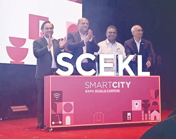 From left: Malaysia Digital Economy Corporation CEO Anuar Fariz Fadzil, Gobind, Digital Ministry Deputy Secretary General (Digital Development) MA Sivanesan Marimuthu and Digital Nasional Bhd CEO Datuk Azman Ismail at the launch of the 100-day countdown to Smart City Expo Kuala Lumpur 2025.