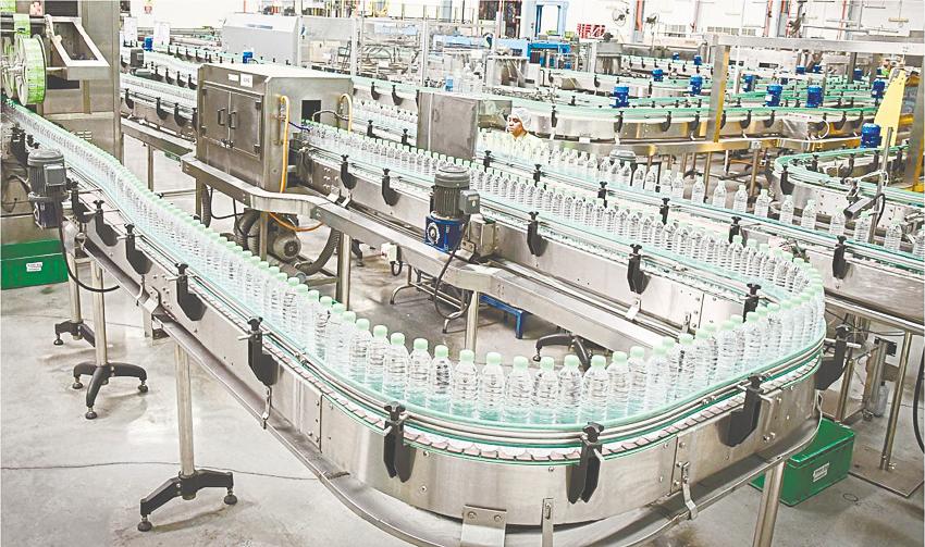 View of a Spritzer production line. The company continues to introduce sustainable packaging alternatives for its bottled water products. – Spritzer website pic