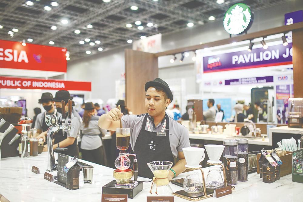 Starbucks Malaysia’s booth at the Pernas International Franchise Festival 2025 showcased its latest beverage lineup, focusing on Starbucks Reserve stores and their unique manual brewing techniques. – ADAM AMIR HAMZAH/THESUN