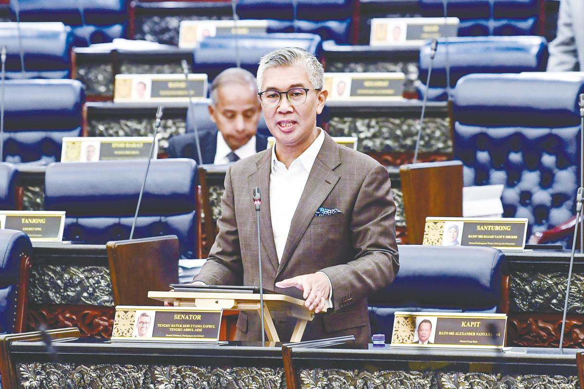 Tengku Zafrul speaking during a ministerial briefing on reciprocal trade negotiations with the US in the Dewan Rakyat today. – Bernamapic