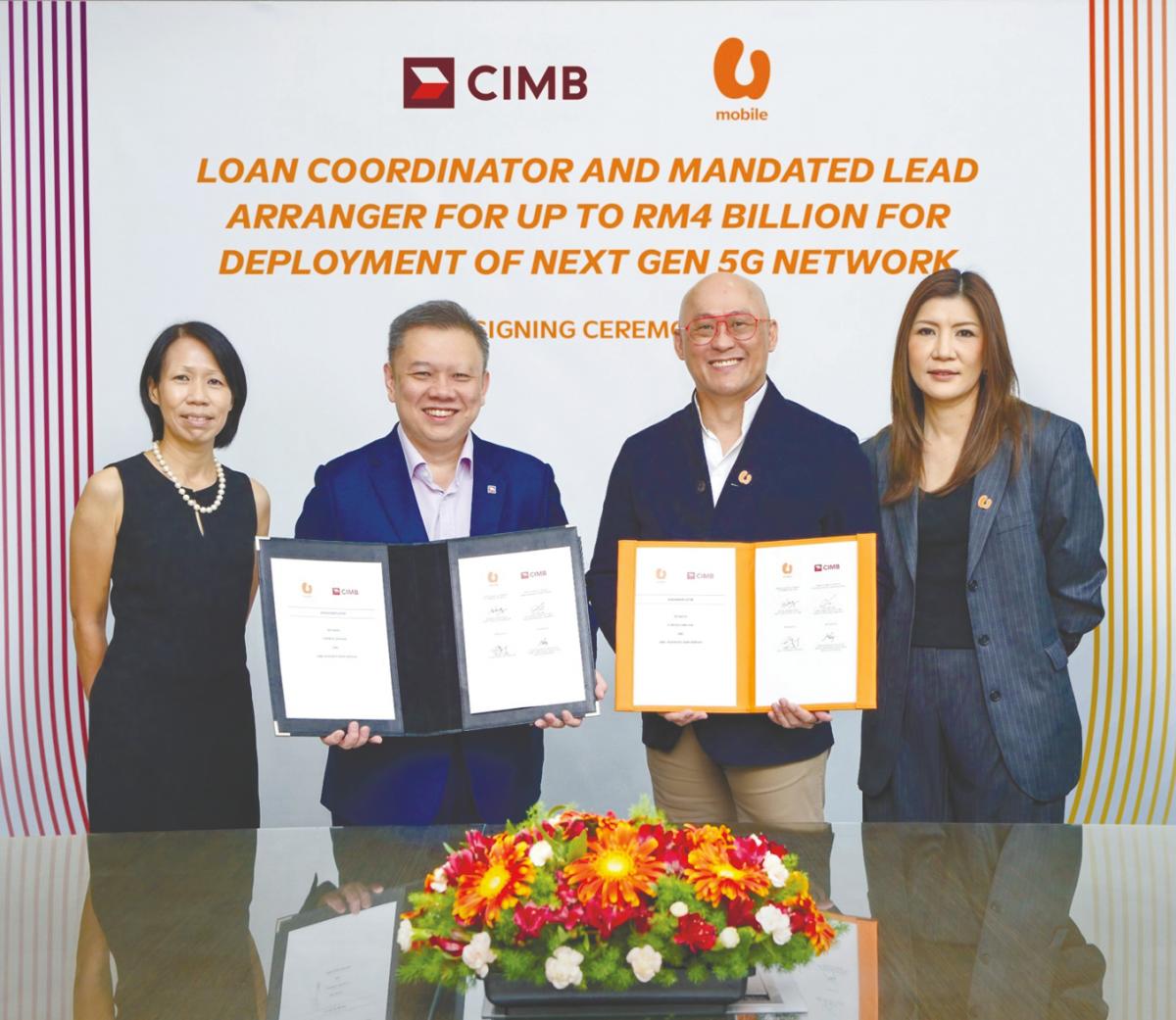 From feft: Denise Wong, Chu, Heang Tuck and Tsang at the signing ceremony.