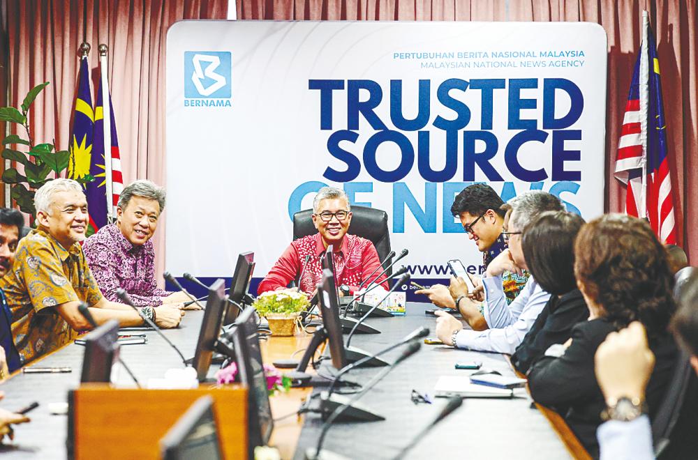 Tengku Zafrul (centre) at the Concorde Club Industrial Take Off Year 2024 at Wisma Bernama today. Also present is Malaysian National News Agency chairman Datuk Seri Wong Chun Wai (second from left). – Bernamapic
