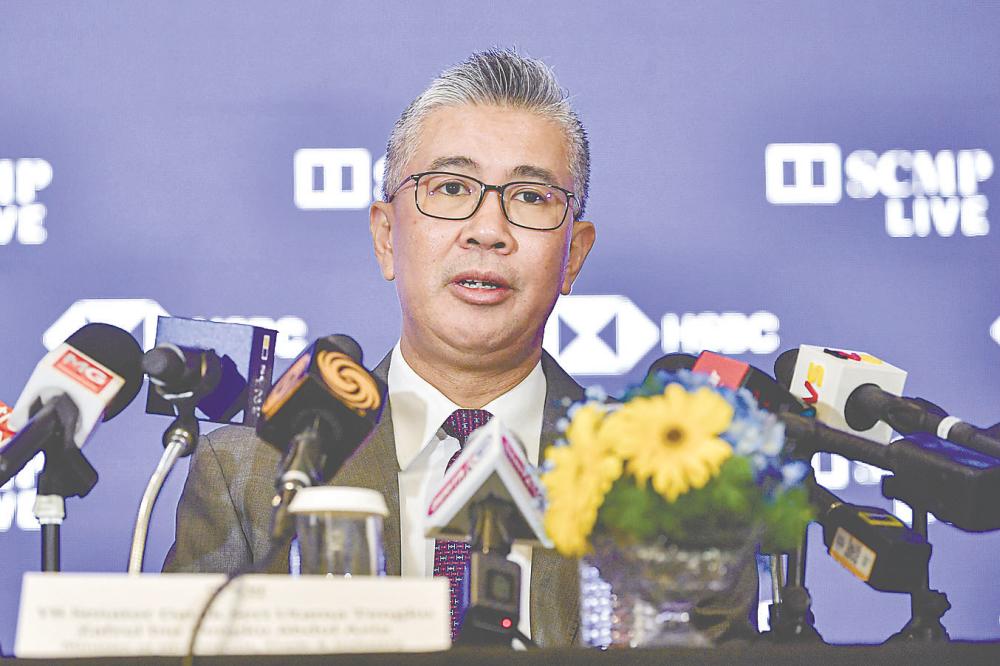 Tengku Zafrul speaking to reporters at the South China Morning Post China Conference Southeast Asia 2025. – Bernamapic