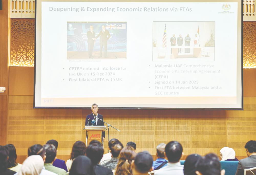 Tengku Zafrul speaking at a media conference on Miti’s 2024 performance report card and 2025 direction at Menara Miti today. – Bernamapic