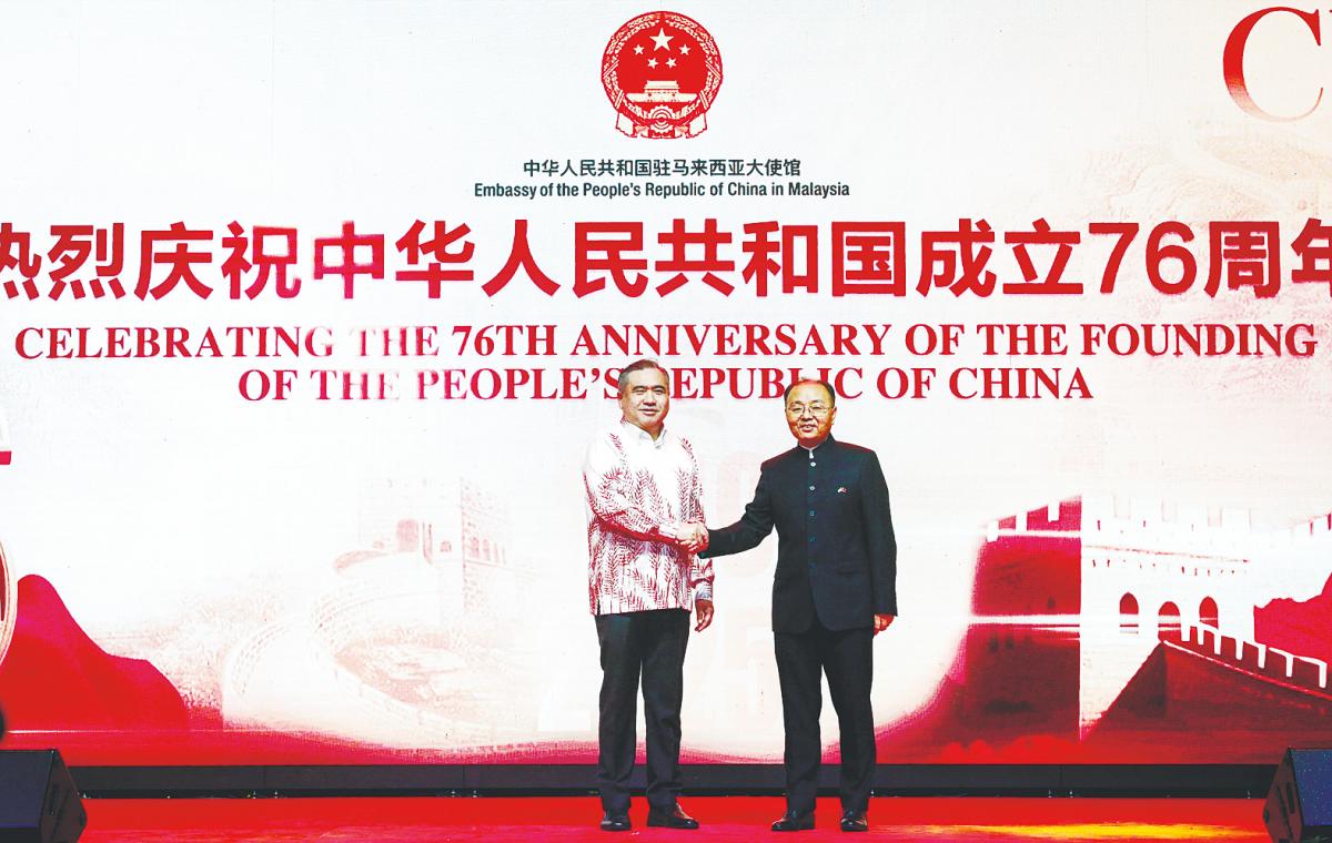 Loke (left) and Ouyang at a reception in Kuala Lumpur on Monday to mark the 76th anniversary of the founding of China. – Bernamapic
