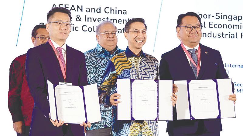 Front row, from left: Zhang, Fad’l Mohamed and Khairi Shahrin Arief. Back row, from left, are Sikh Shamsul Ibrahim and Mohammad Faiz.