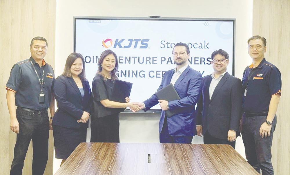 From left: KJTS Group executive director Sheldon Wee, independent non-executive director Elaine Law Soh Ying, Azura, Stonepeak investment team managing director Zach Ennis, KJTS Group independent non-executive director Ng Kok Ken and group managing director Lee Kok Choon at the signing ceremony.