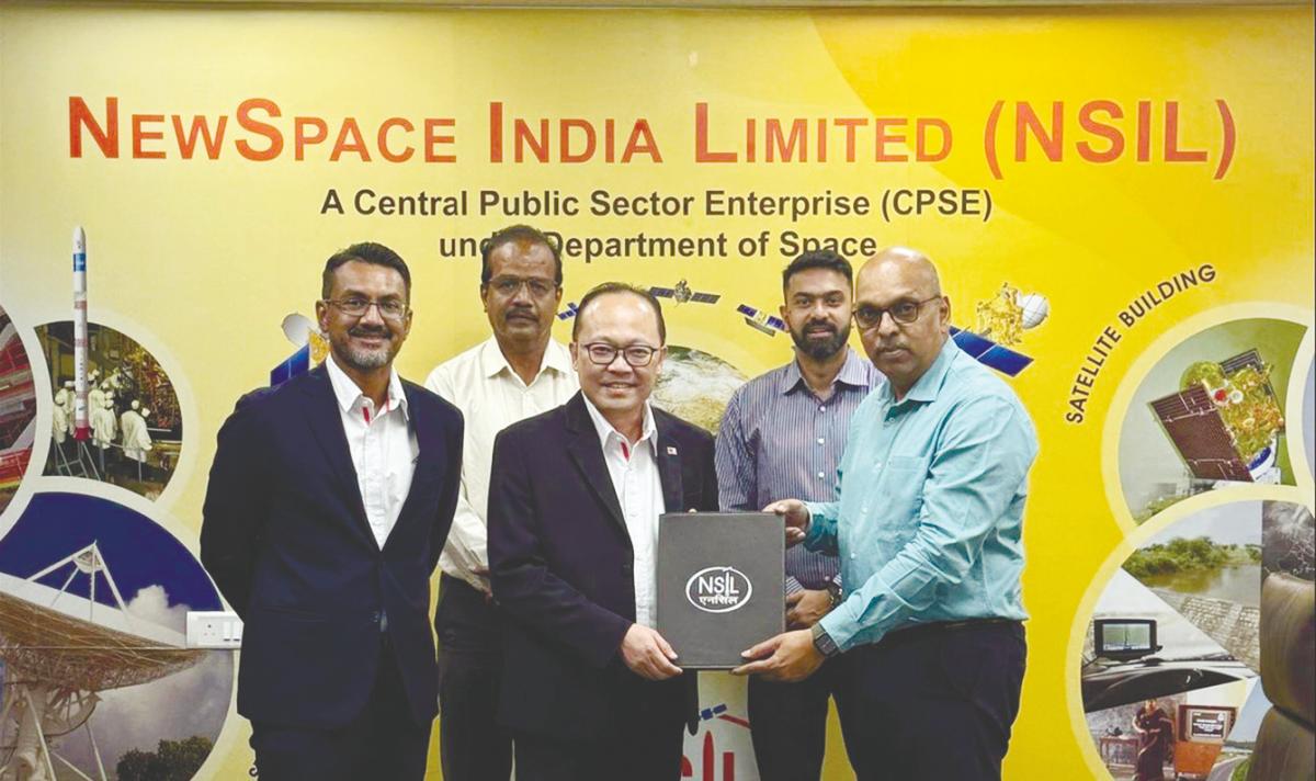 Front row, from left: Measat Global chief commercial officer Ganendra Selvaraj, Yau and and Radhakrishnan. Back row, from left: NSIL strategy and technical director A Arunachalam and chief manager Nilanjan Routh at the signing ceremony in Bengaluru.