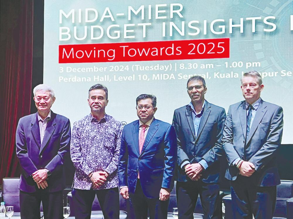 From left: Sunway University economics studies programme director Professor Yeah Kim Leng, Wan Suhaimie, Mida CEO Datuk Sikh Shamsul Ibrahim Sikh Abdul Majid, Anthony Dass and Eurocham Malaysia board member Karl Godderis at the forum.