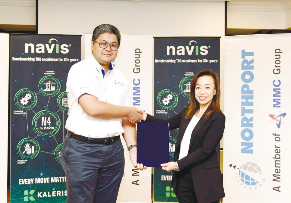 Azman Shah (left) and Kaleris vice-president sales and general manager for Asia-Pacific See Jean Lau after signing a partnership agreement.