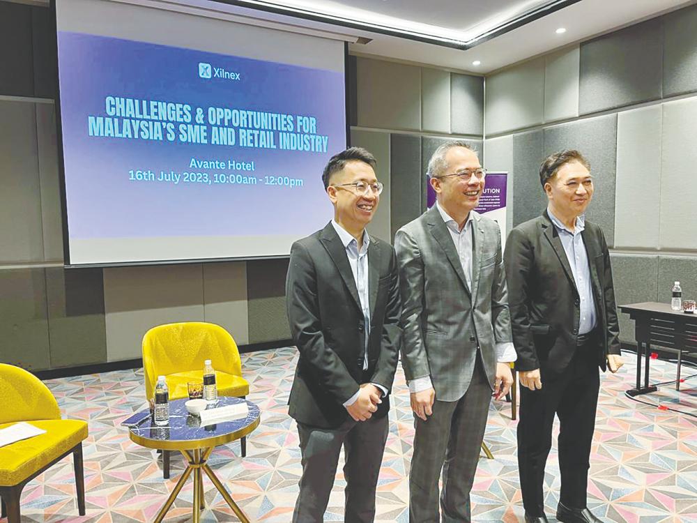 From left: Ooi, Ng and Malaysia Retailer Chains Association deputy president Datuk Liew Bin at a press conference themed ‘Impact and Challenges Faced by SME and Retailer Community.