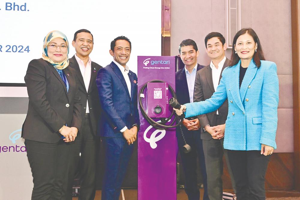 From left: Megawati, Yusri, Shaharuddin, Shah Yang, Izwan and TM One executive vice-president Shazurawati Abd Karim at the MoU exchange.