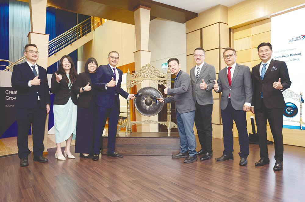 From left: M&amp;A Securities Sdn Bhd corporate finance deputy head Danny Wong, West River Bhd independent non-executive directors Tan Yiing Fung and Kho Zhen Qi, independent non-executive chairman Datuk Seri Dr Shahril Mokhtar, Lim, executive director Cheong Wee Kim and independent non-executive director Wong Kian Leon, and M&amp;A Equity Holdings Bhd managing director (corporate finance) and executive director Datuk Bill Tan at the listing ceremony.