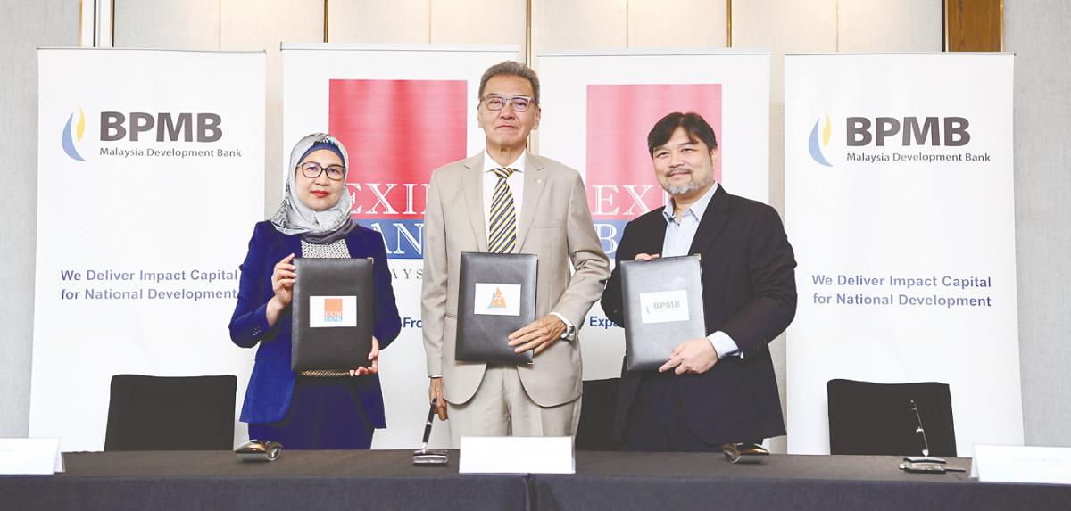 From left: Exim Bank chief business officer Faizah Mustapa, Duta Marine director and shareholder Mahyudden Abdul Wahab and BPMB Mohamed managing director, group corporate &amp; investment banking Nazri Omar after the signing of the FSO Permata Dulang financing agreement.