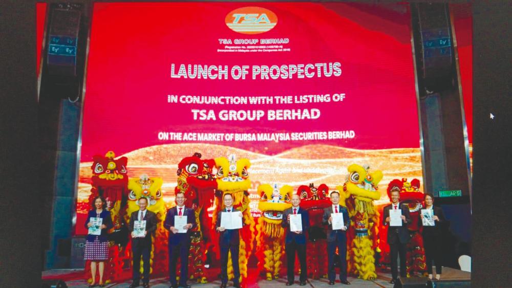 From left: TSA Group director Karmjit Kaur Sarban Singh, director Chong Chin Look, executive director Eric Ng Kim Liang, Chew, executive director Chew Yik Wai, AmInvestment Bank deputy CEO Christopher Ng Kok Wai, head of corporate finance Ho Weng Yew, and TSA Group general manager and head of procurement Jane Loh Pei Ling at the launch.