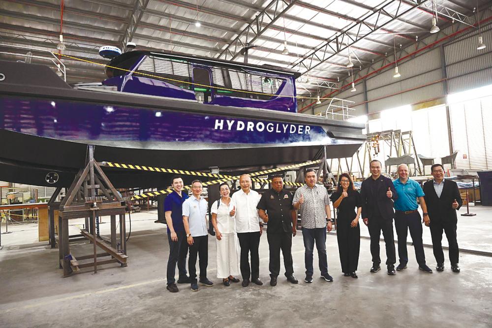 From left: Regulus Offshore CEO Lim Chern Wooi, Malacca Member of Parliament Khoo Poay Tiong, Yinson executive director Bah Kim Lian, Yinson group executive chairman Lim Han Weng, Malacca State Executive Council (works, infrastructure, public facilities and transport) Datuk Hameed Mytheen Kunju Basheer, Loke, Invest Melaka CEO Datuk Ginie Lim, Lim Chern Yuan, Barclay, and Teoh.