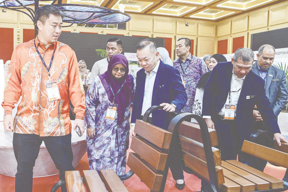 Chan (third from left) visiting the MFFM exhibition hall at the World Trade Centre Kuala Lumpur yesterday. – BERNAMAPIC
