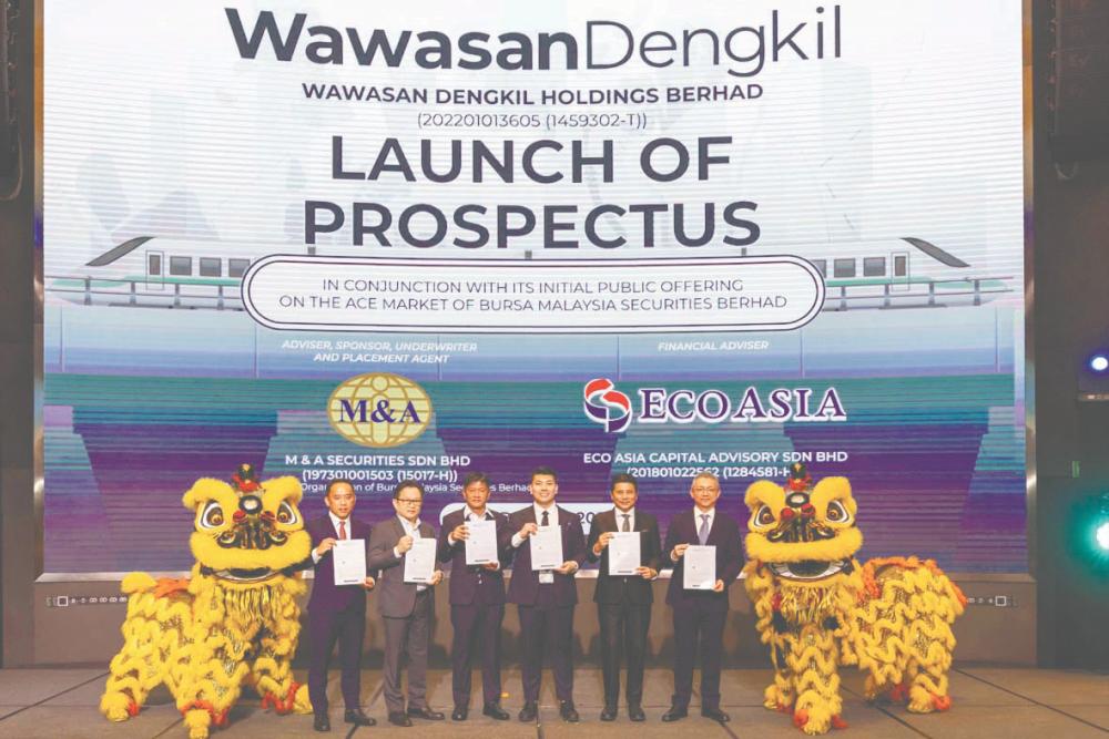 From left: Eco Asia Capital Advisory Sdn Bhd managing director Kelvin Khoo, Wawasan Dengkil Holdings Bhd independent non-executive chairman Thien Chiet Chai, executive directors Lim Kok Seng, Lim Sook Yik, M&amp;A Equity Holdings Bhd managing director Datuk Bill Tan, and M&amp;A Securities Sdn Bhd head of corporate finance Gary Ting. corporate finance head Gary Ting.