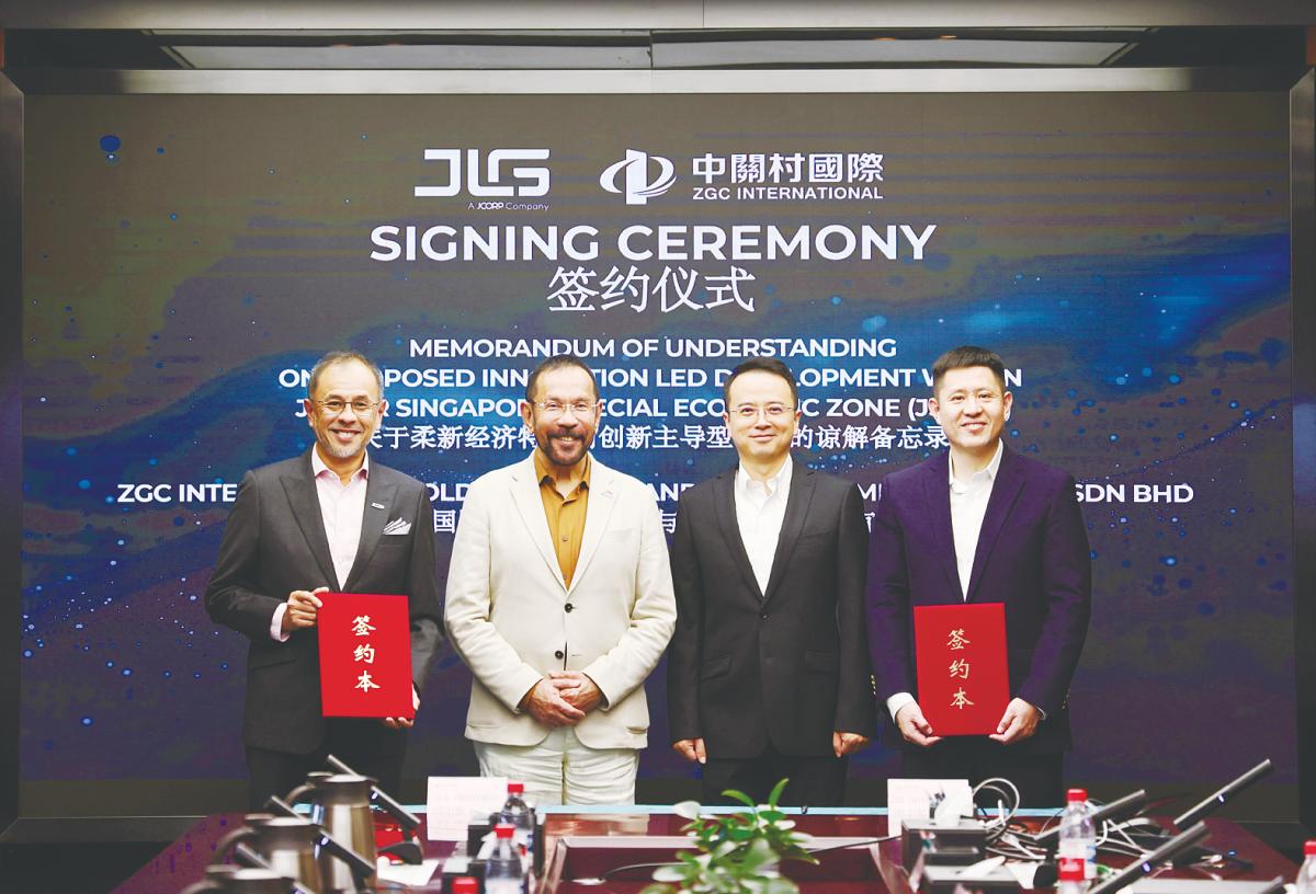 From left: Akmal, Johor Corporation president &amp; CEO, and JLG chairman Datuk Syed Mohamed Syed Ibrahim, ZGC International Holding Ltd chairman Zhou Rui and general manager Lu Jiang.