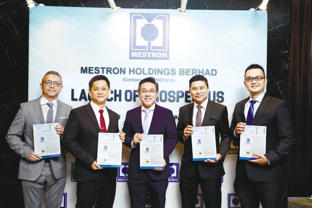 From left: M&amp;A Securities Sdn Bhd head of corporate finance Gary Ting, Mestron Holdings Bhd executive director Gary Loon, Por, M&amp;A Securities managing director of corporate finance Datuk Bill Tan and deputy head of corporate finance Danny Wong.