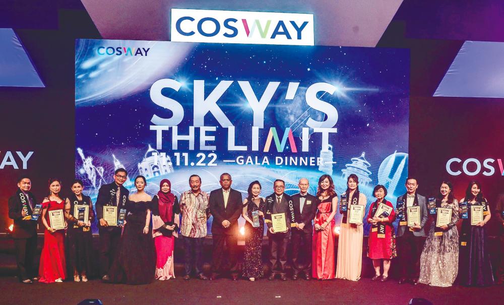 Tan (seventh from left) with VIPs and award recipients during the event on Friday. – Adib Rawi Yahya/theSun