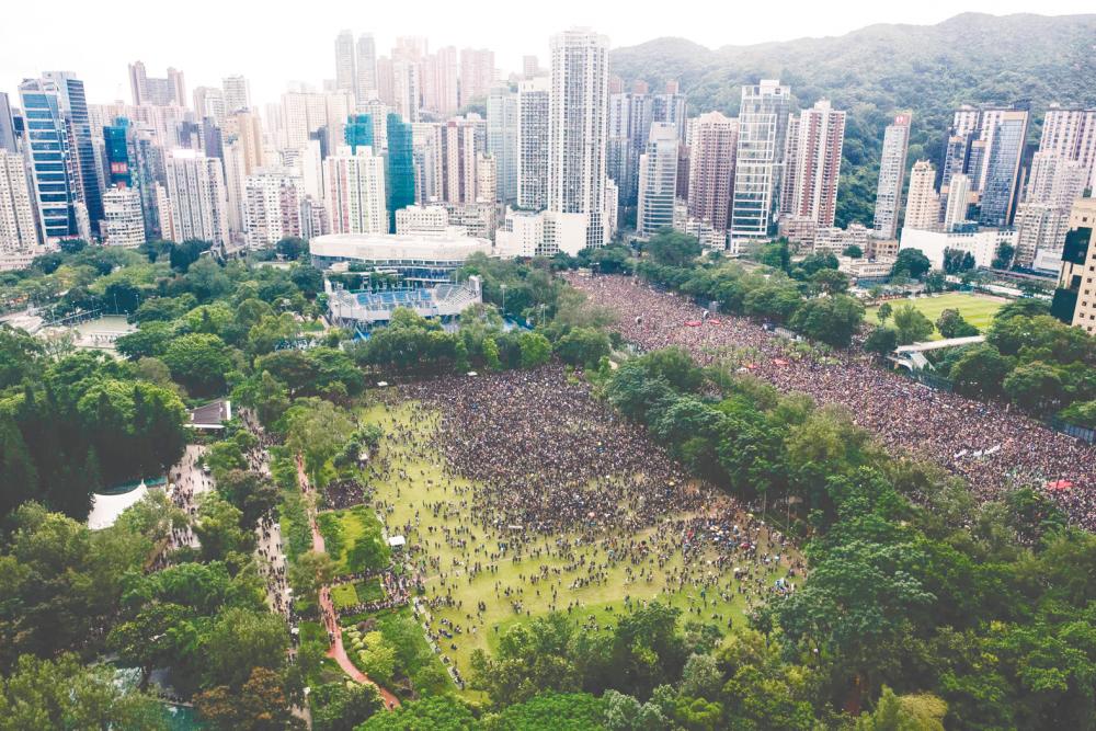 Protesters gather for a rally in Victoria Park in Hong Kong on Sunday, in the latest opposition to a planned extradition law that has since morphed into a wider call for democratic rights in the semi-autonomous city. – AFPpix