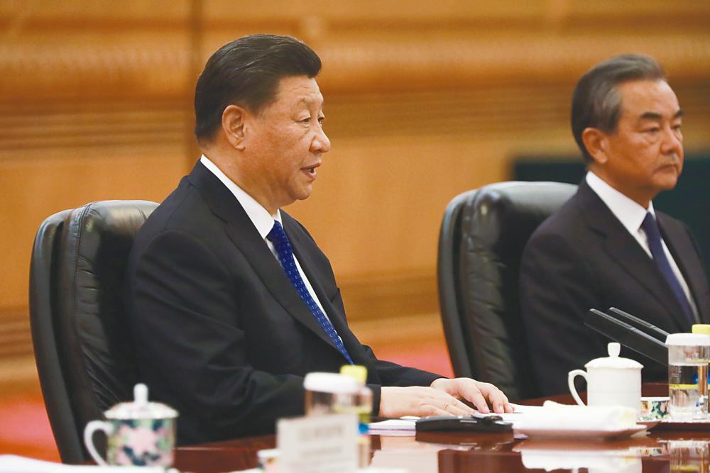 President Xi Jinping (left) is highly unlikely to lose face in a trade war with the US. He can wait it out until more balanced minds again occupy the White House. – Reuterspix