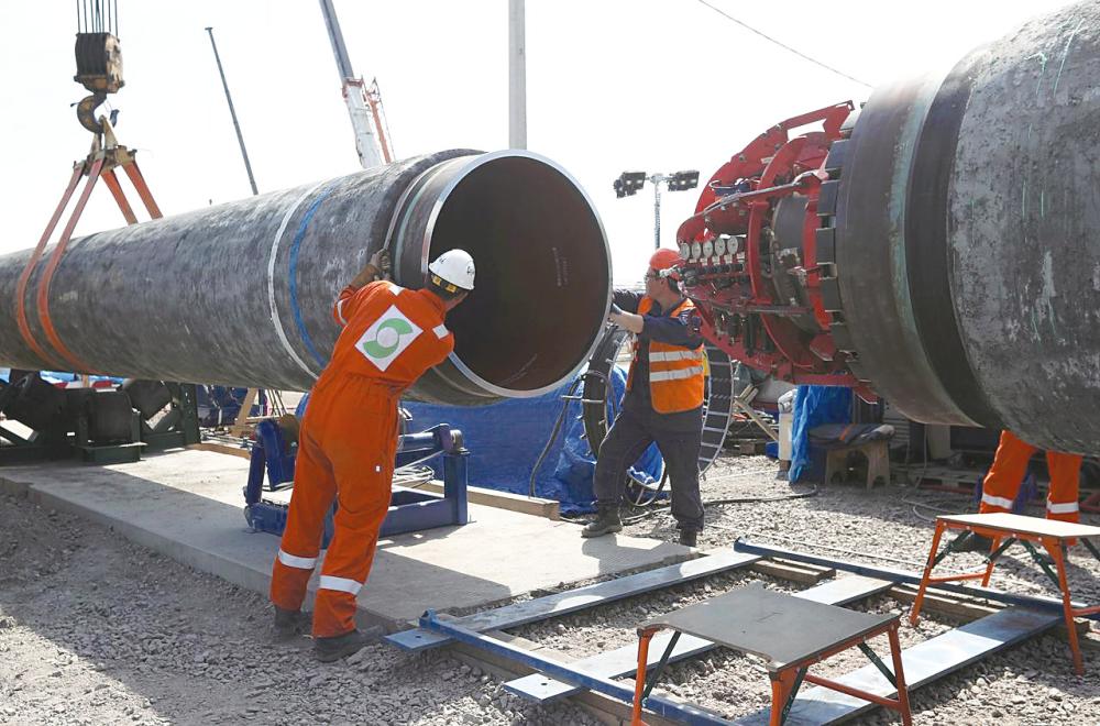 Workers at the construction site of the Nord Stream 2 gas pipeline, near the town of Kingisepp, Leningrad region, Russia, in June this year. – REUTERSPIX