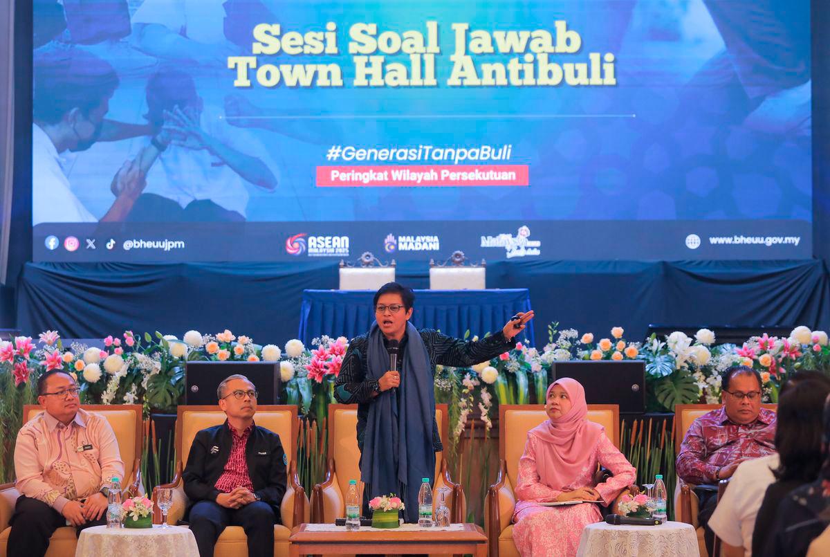 Azalina, flanked by Communications Minister Datuk Fahmi Fadzil and Education Minister Fadhlina Sidek during the Tribunal Town Hall on Anti-Bullying yesterday. – ADIB RAWI YAHYA/THESUN