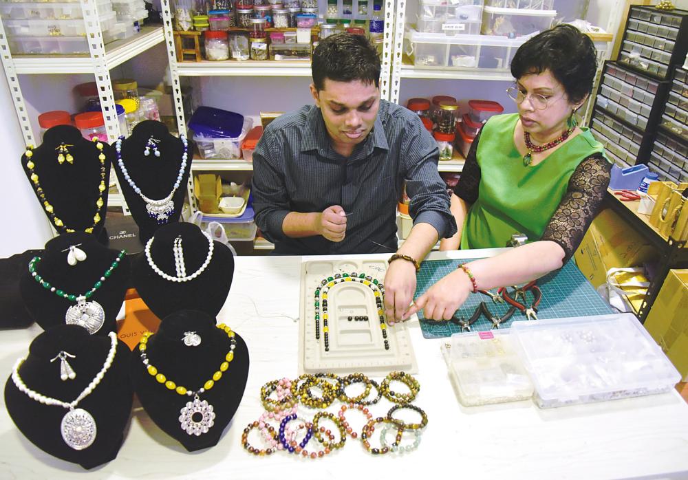 Rupika often assists Ryan when he is working on his creations. – SYAZWAN KAMAL/THESUN