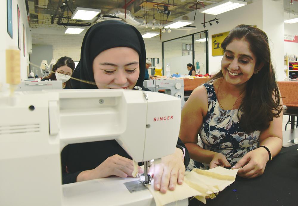 Kalpana said she uses Singer sewing machines exclusively as she has a strong emotional connection to the brand. – SYAZWANKAMAL/THESUN